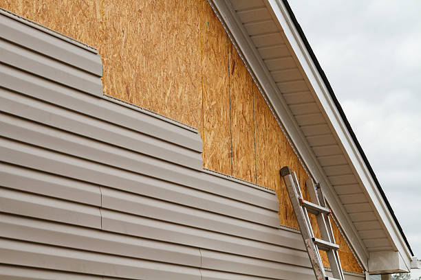 Professional Siding technician working in Newburg, PA